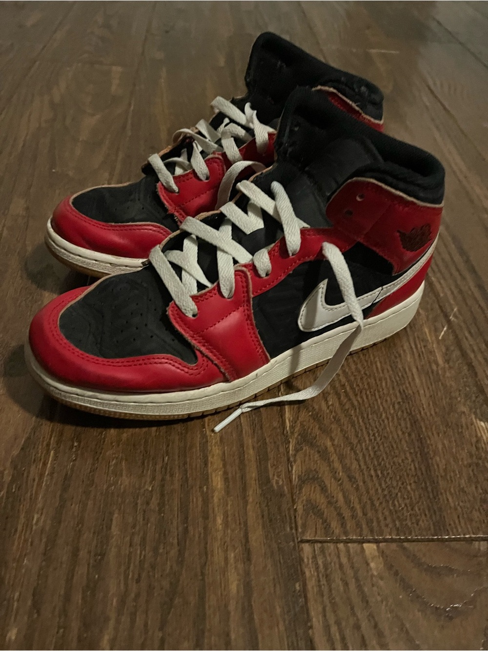 Nike Kids Red and Black High-Top Sneakers with White Swoosh